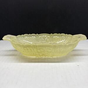 Vintage frosted glass relish dish with embossed floral motifs and tab handles.